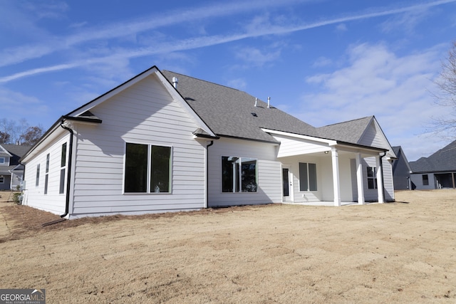 rear view of house featuring a patio area