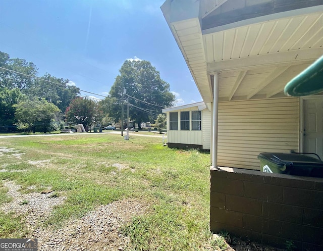 view of yard featuring a carport
