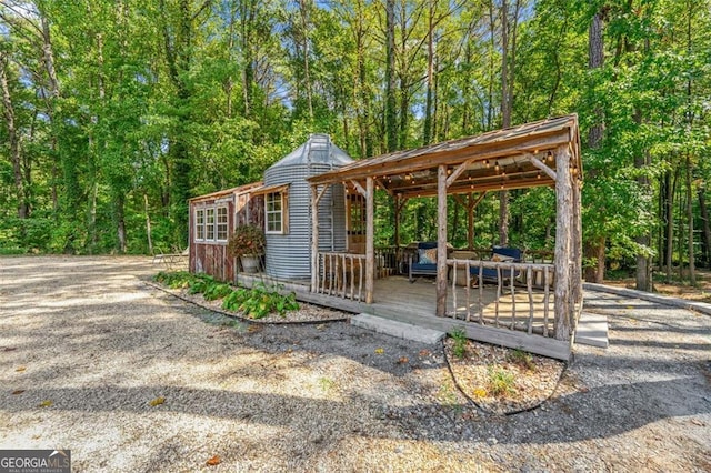 exterior space with a wooden deck