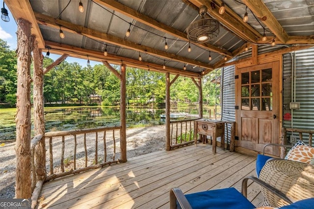 wooden deck with a water view