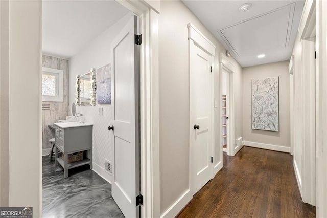 hallway featuring dark hardwood / wood-style floors