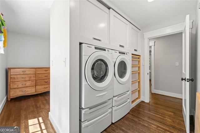 washroom with dark hardwood / wood-style floors and separate washer and dryer