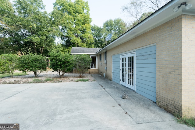 view of patio featuring french doors