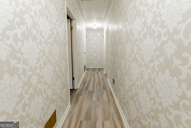 hallway with light wood-type flooring