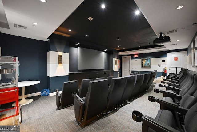 carpeted cinema room with recessed lighting, visible vents, and baseboards