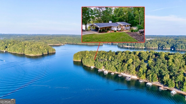 birds eye view of property featuring a water view