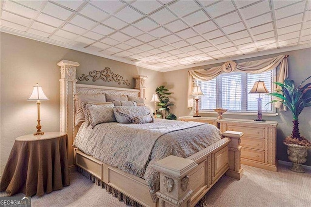 bedroom with light colored carpet