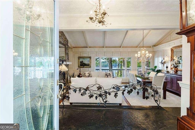 interior space with vaulted ceiling with beams and a chandelier