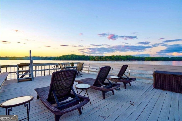 deck at dusk with a water view