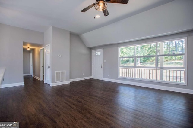 unfurnished living room featuring ceiling fan, lofted ceiling, and dark hardwood / wood-style floors