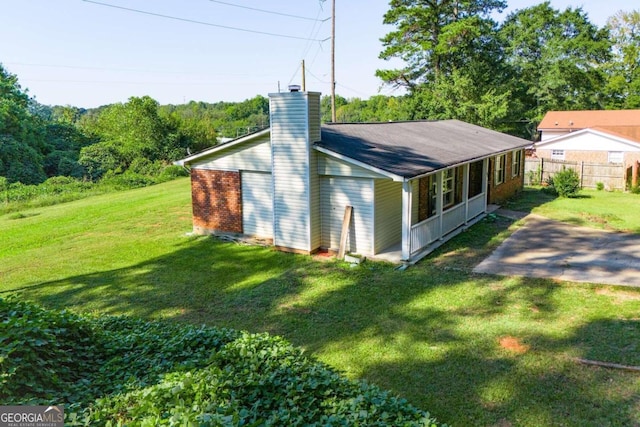 exterior space with a lawn