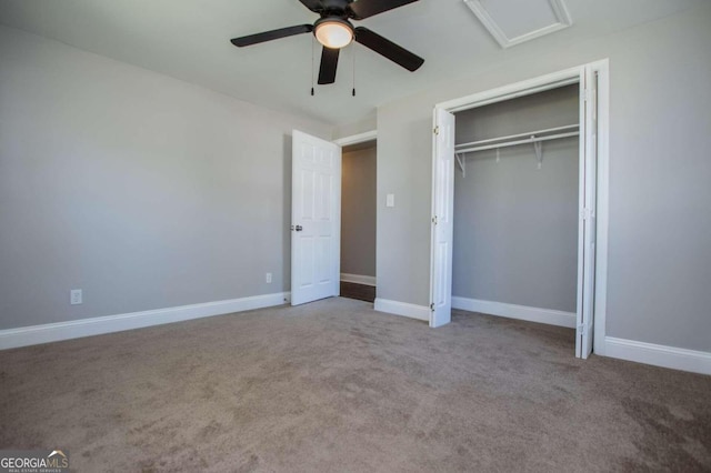 unfurnished bedroom with ceiling fan, a closet, and light carpet