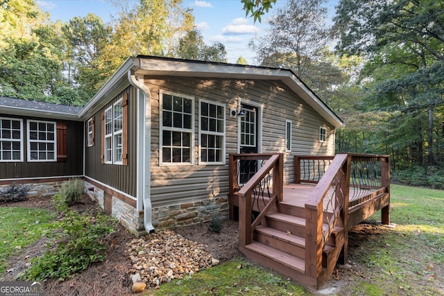 view of front of home with a deck