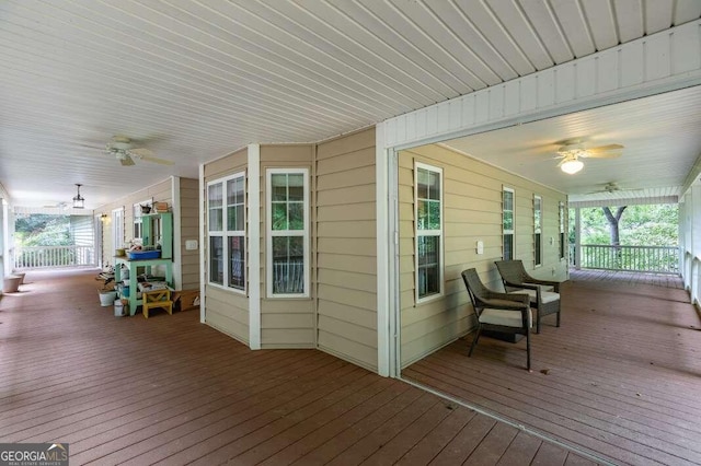 deck featuring ceiling fan and a porch