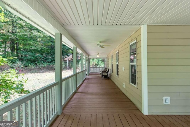 wooden terrace featuring a porch