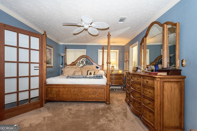 bedroom with carpet floors, crown molding, a textured ceiling, and ceiling fan