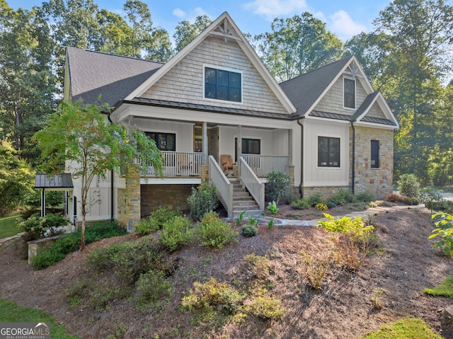 craftsman-style home with covered porch