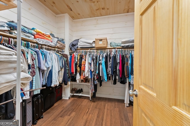 spacious closet featuring hardwood / wood-style floors