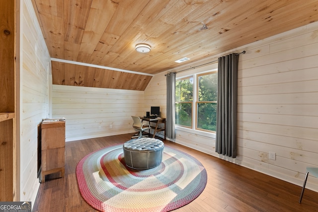 sitting room with wood walls, wood ceiling, vaulted ceiling, and hardwood / wood-style floors