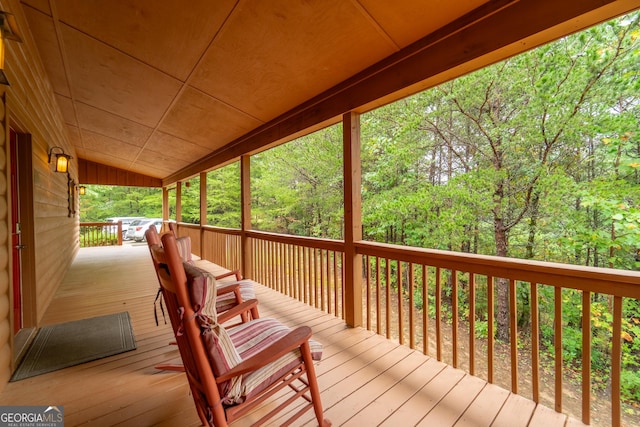 26 Clarice Ln, Sautee Nacoochee, GA 30571 - wooden terrace with a wooded view