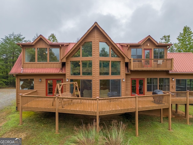 26 Clarice Ln, Sautee Nacoochee, GA 30571 - rear view of property featuring metal roof, a deck, and board and batten siding