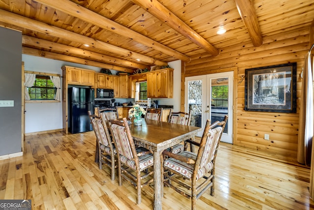 dining space featuring wood ceiling, beam ceiling, light hardwood / wood-style floors, and a wealth of natural light