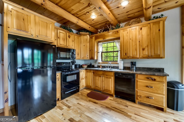 kitchen with beamed ceiling, wood ceiling, sink, black appliances, and light wood-type flooring