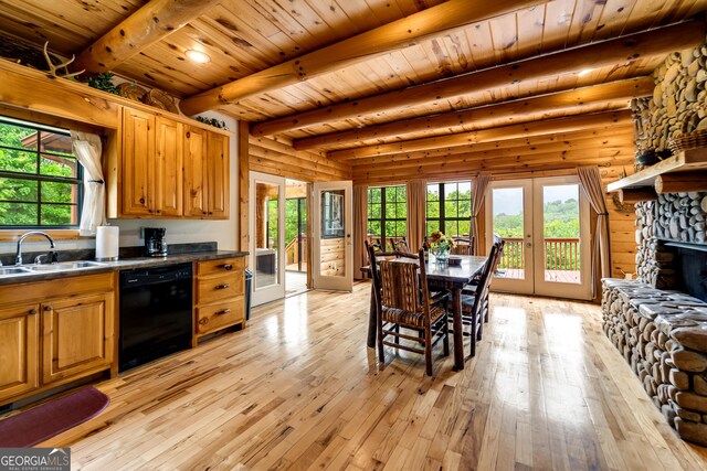 26 Clarice Ln, Sautee Nacoochee, GA 30571 - kitchen featuring dishwasher, a sink, dark countertops, light wood-type flooring, and brown cabinets