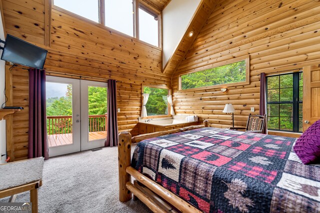 bedroom featuring access to exterior, log walls, high vaulted ceiling, carpet, and french doors