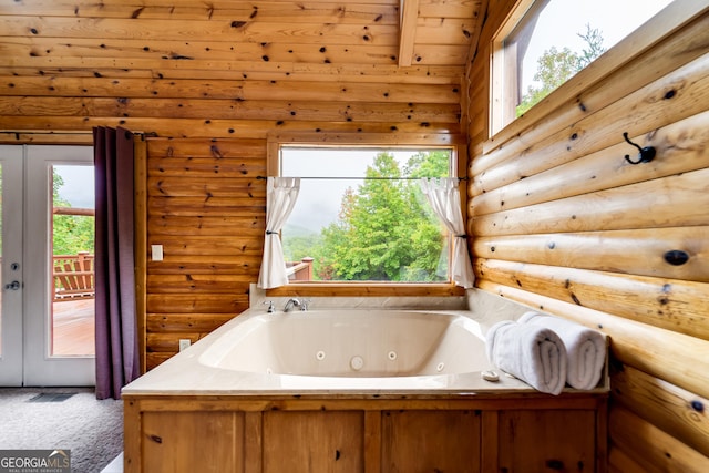 26 Clarice Ln, Sautee Nacoochee, GA 30571 - bathroom featuring log walls, a whirlpool tub, and wood ceiling