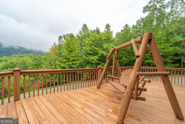26 Clarice Ln, Sautee Nacoochee, GA 30571 - wooden terrace with view of wooded area