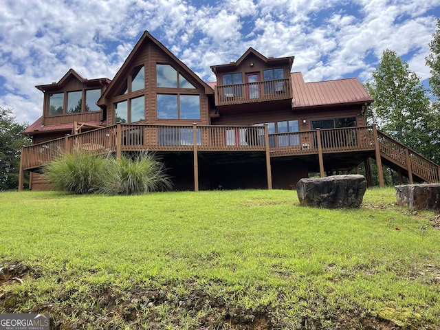 26 Clarice Ln, Sautee Nacoochee, GA 30571 - back of property with a yard, a deck, and metal roof
