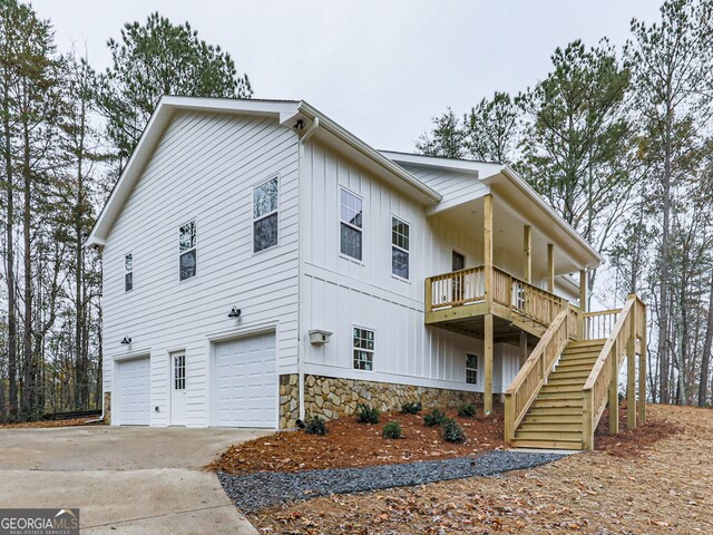 view of property exterior with a garage