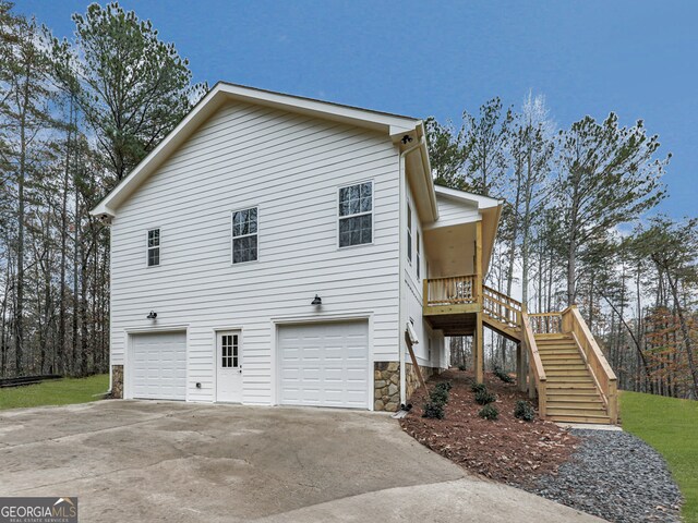 view of property exterior with a garage