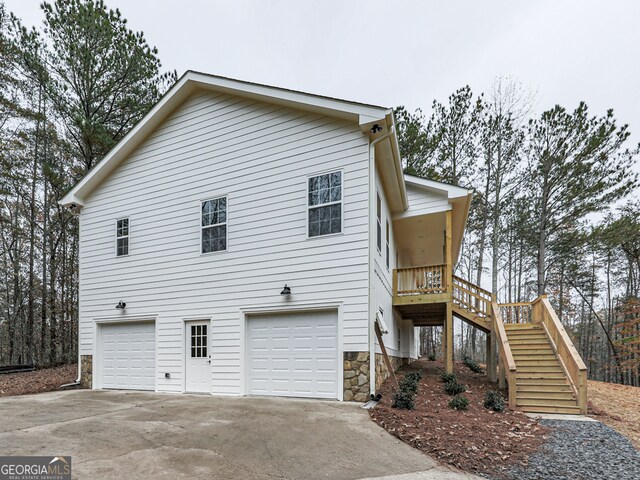 view of property exterior with a garage