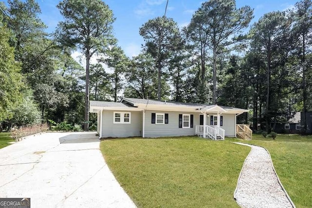 ranch-style house with a front yard