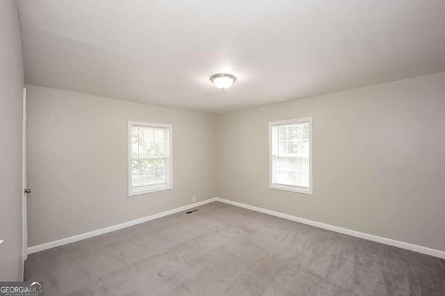 view of carpeted spare room