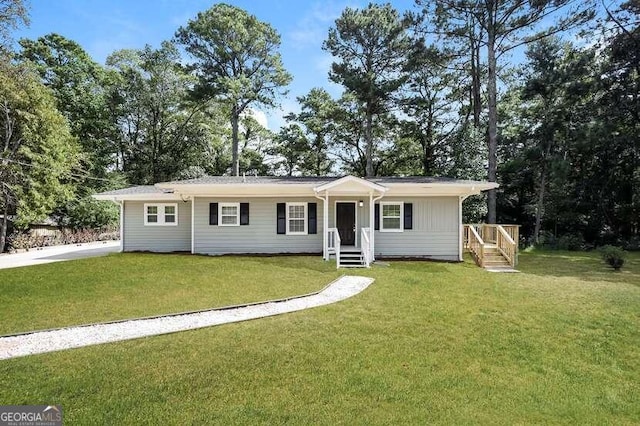 ranch-style home with a front yard