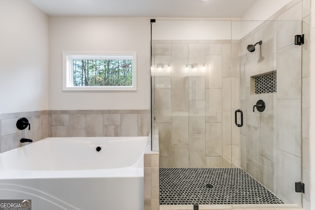 bathroom with independent shower and bath