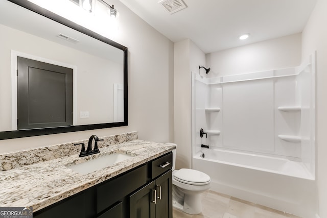 full bathroom featuring vanity, toilet, and tub / shower combination