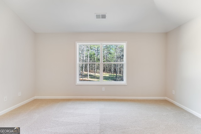 view of carpeted spare room