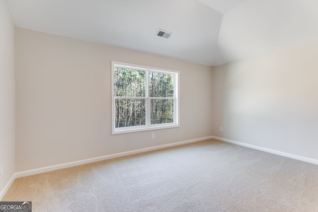 unfurnished room featuring carpet floors