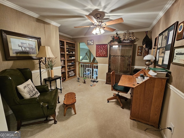 office area featuring ornamental molding, ceiling fan, and carpet floors