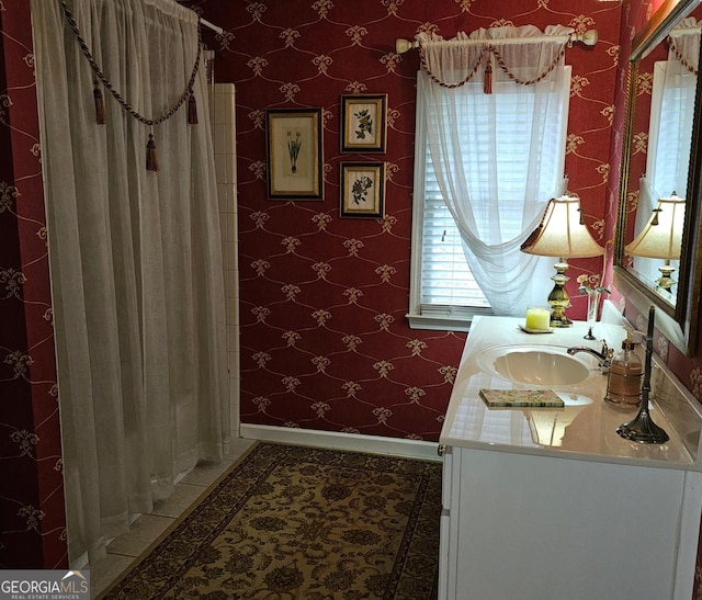 bathroom featuring vanity and a shower with curtain