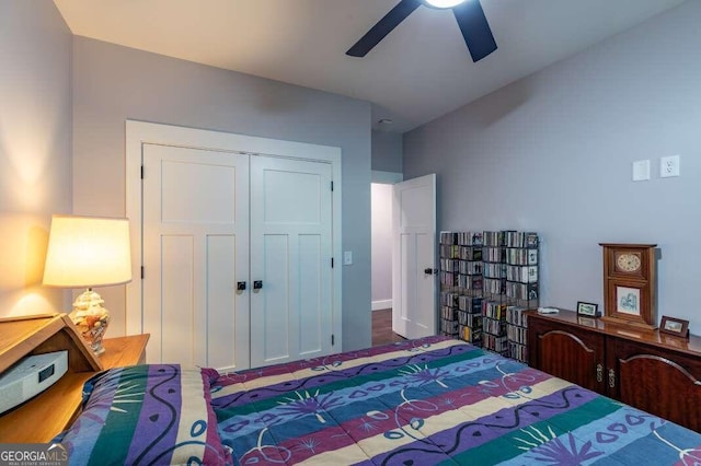 bedroom featuring ceiling fan and dark wood-type flooring