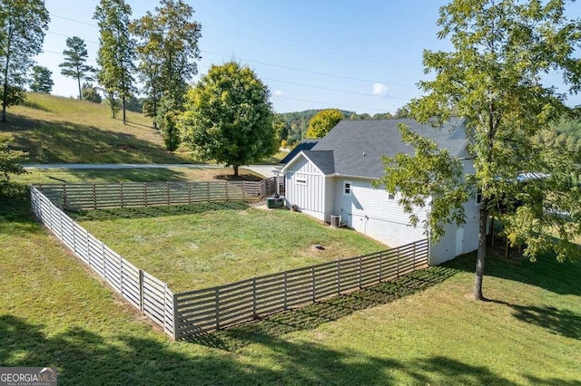 view of property exterior with a sunroom and a lawn