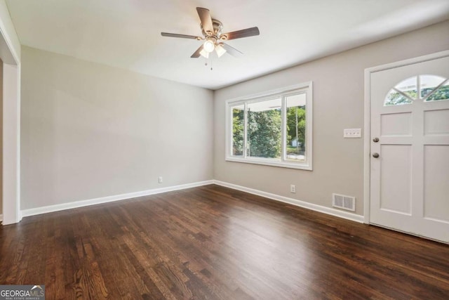 entrance foyer with ceiling fan and dark hardwood / wood-style flooring