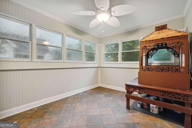 sunroom / solarium with ceiling fan