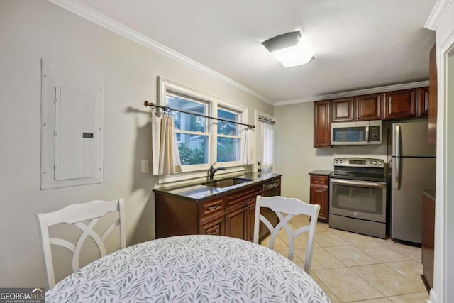 kitchen featuring electric panel, light tile patterned flooring, sink, stainless steel appliances, and crown molding