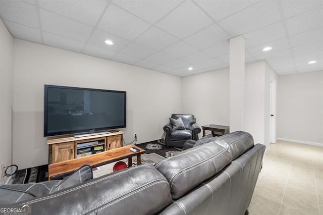 tiled living room with a drop ceiling